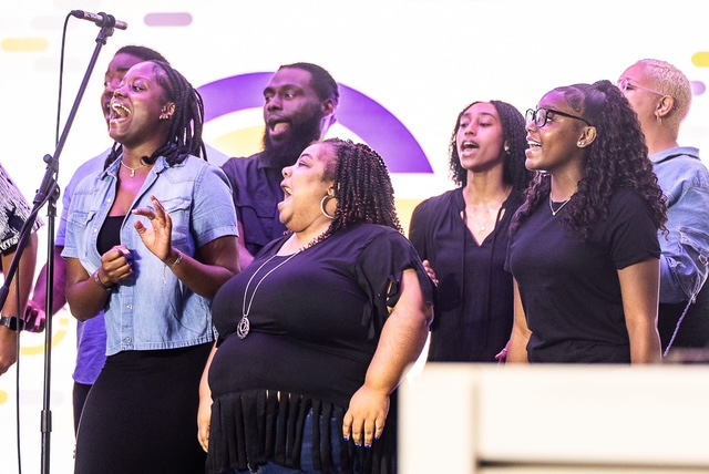 A group sharing a musical moment together